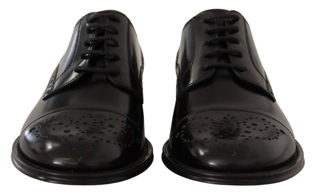 Chaussures Derby formelles en cuir noir Dolce & Gabbana pour homme, détail wingtip, style élégant et sophistiqué.