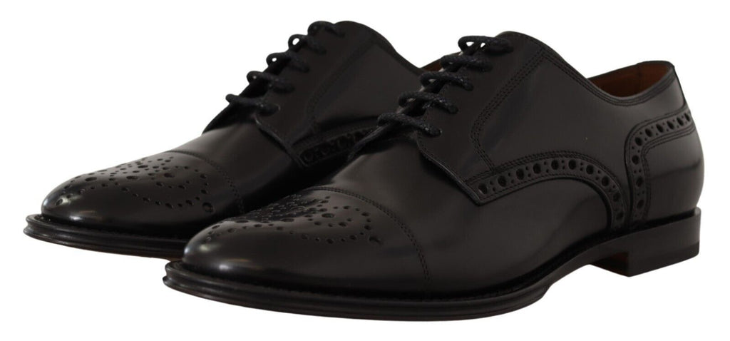 Chaussures Derby formelles en cuir noir de Dolce & Gabbana pour homme, style wingtip avec détails élégants.