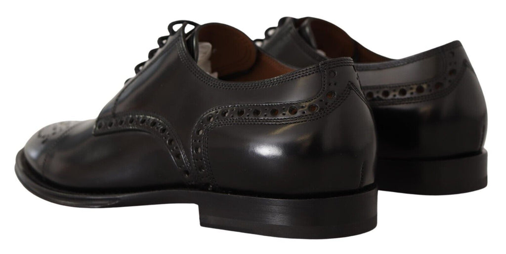 Chaussures Derby formelles en cuir noir de Dolce & Gabbana pour homme, style wingtip avec détails élégants.