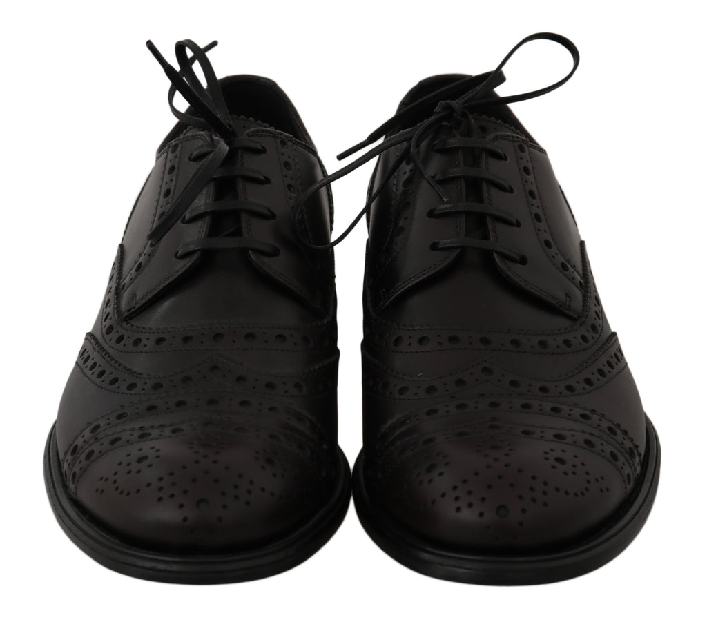Chaussures oxford en cuir noir Dolce & Gabbana, design wingtip avec détails élégants, pour homme formel.