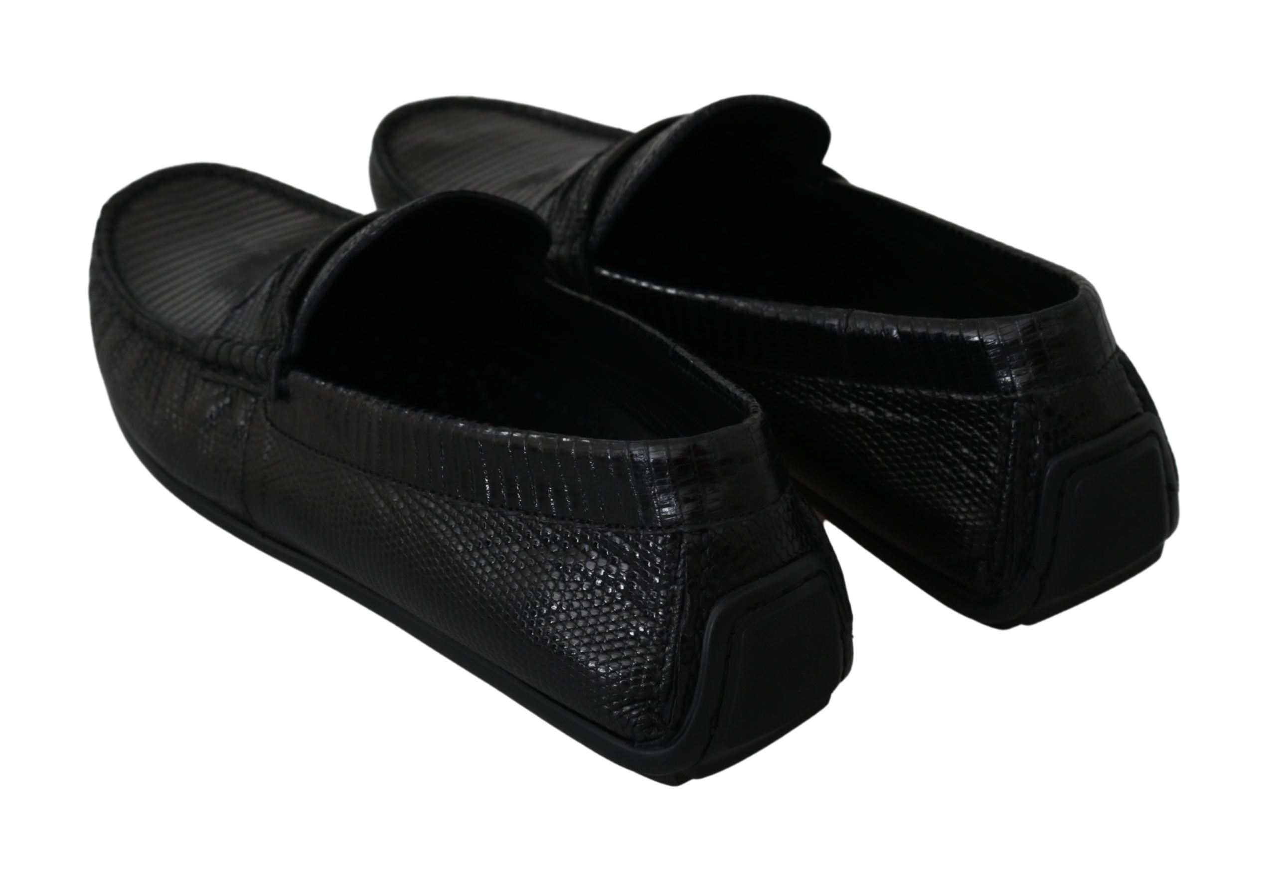 Chaussures mocassins plats en cuir de lézard noir Dolce & Gabbana, élégants et sophistiqués, visibles en détail.