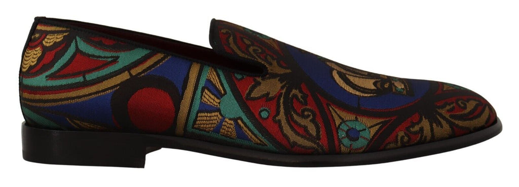 Chaussures slippers Dolce & Gabbana en jacquard multicolore avec motif de couronne, élégantes et confortables.