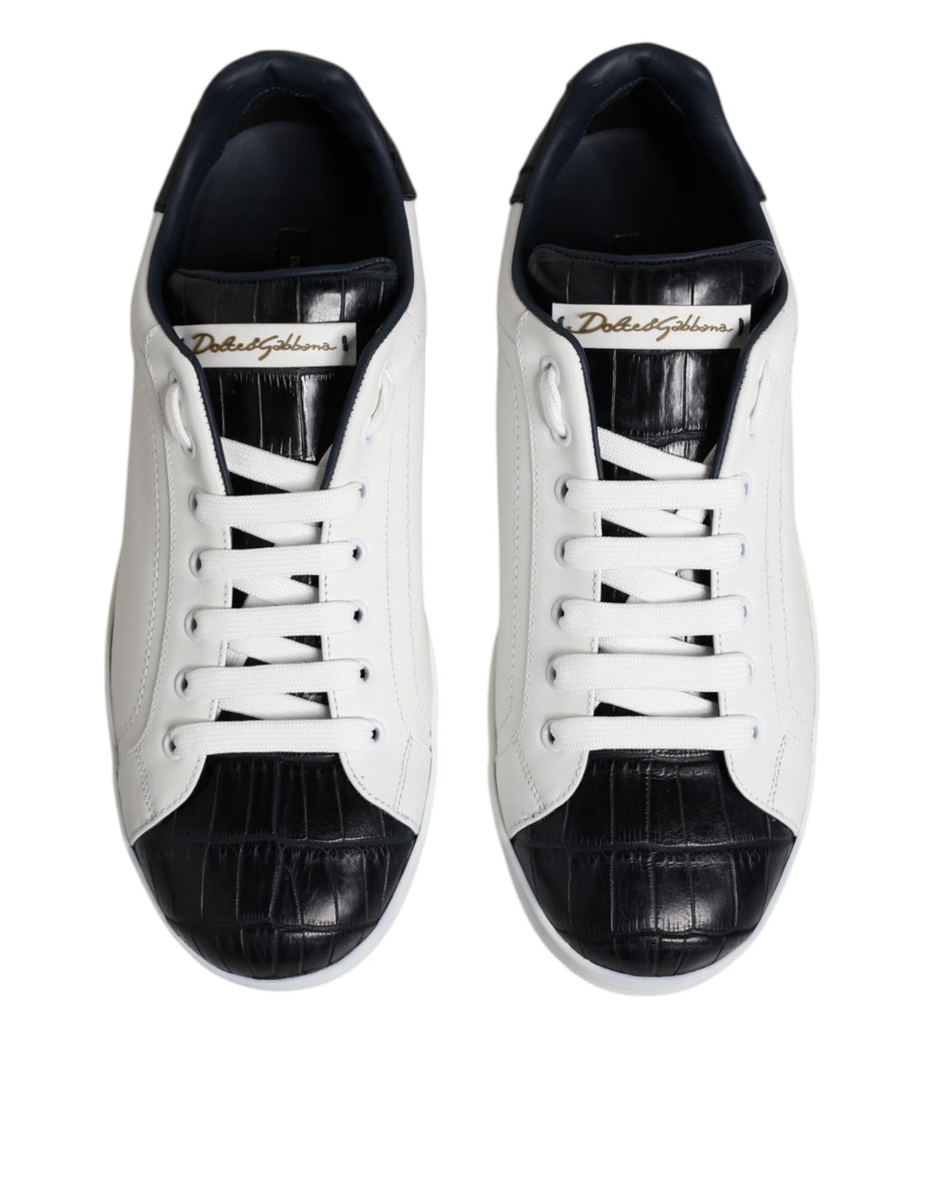 Chaussures portofino en cuir blanc et noir Dolce & Gabbana, baskets élégantes avec détails en cuir et semelle blanche.