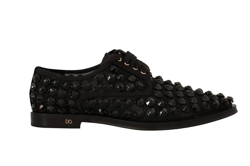 Chaussures plates noires Dolce & Gabbana en dentelle avec clous, style formel et élégant, vue de dessus.