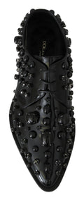 Chaussures Dolce & Gabbana en cuir noir avec cristaux, style brogue élégant et sophistiqué.