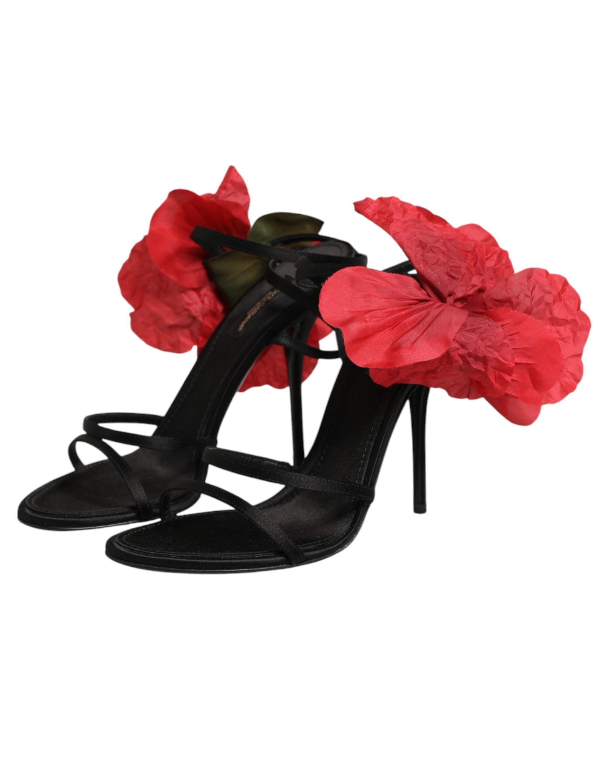 Sandales à talons noires de Dolce & Gabbana en cuir avec lanières fleuries et design élégant, visibles à l'image.