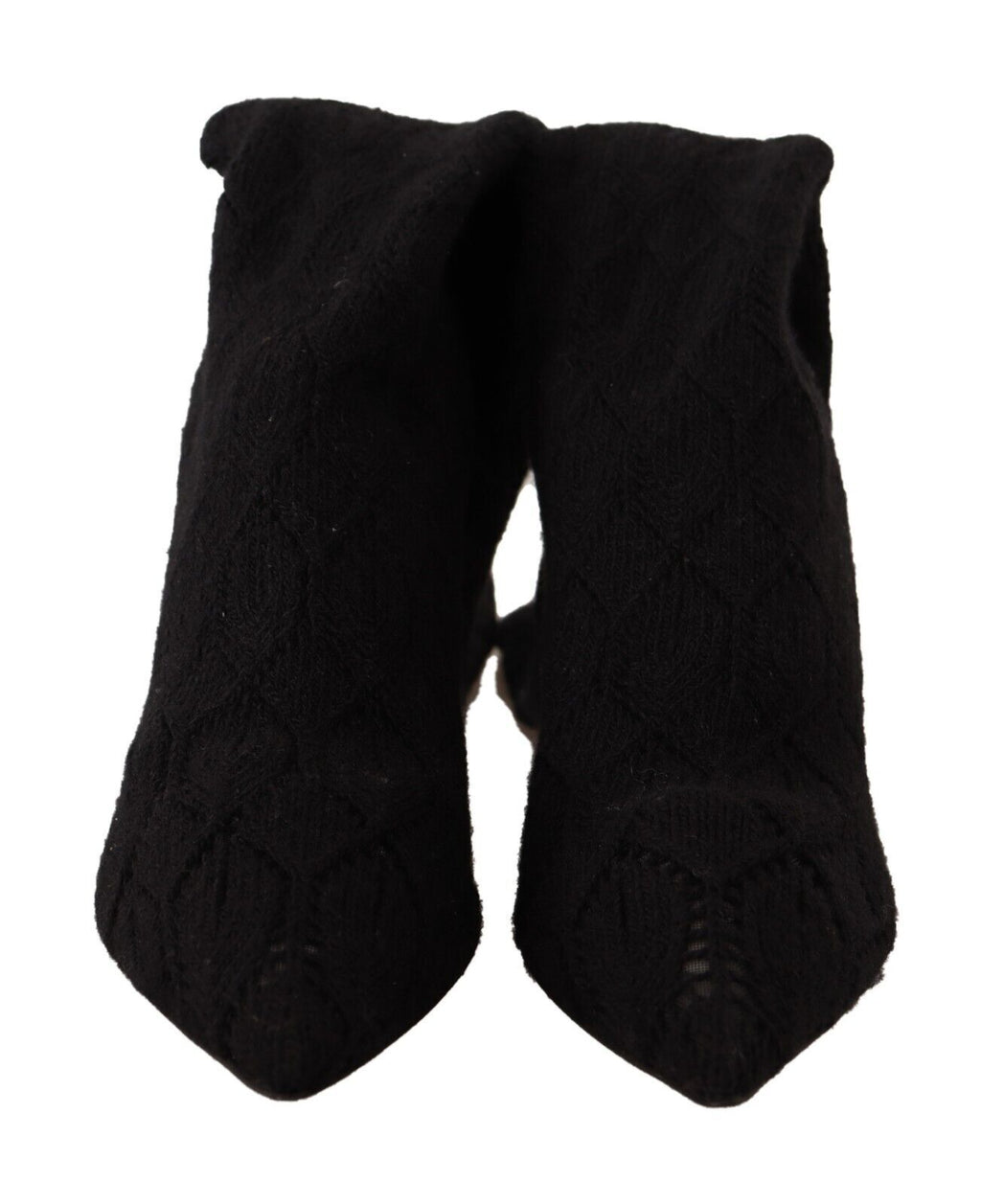 Chaussettes noires extensibles Dolce & Gabbana, portées avec bottines hautes, vues de devant sur un fond neutre.