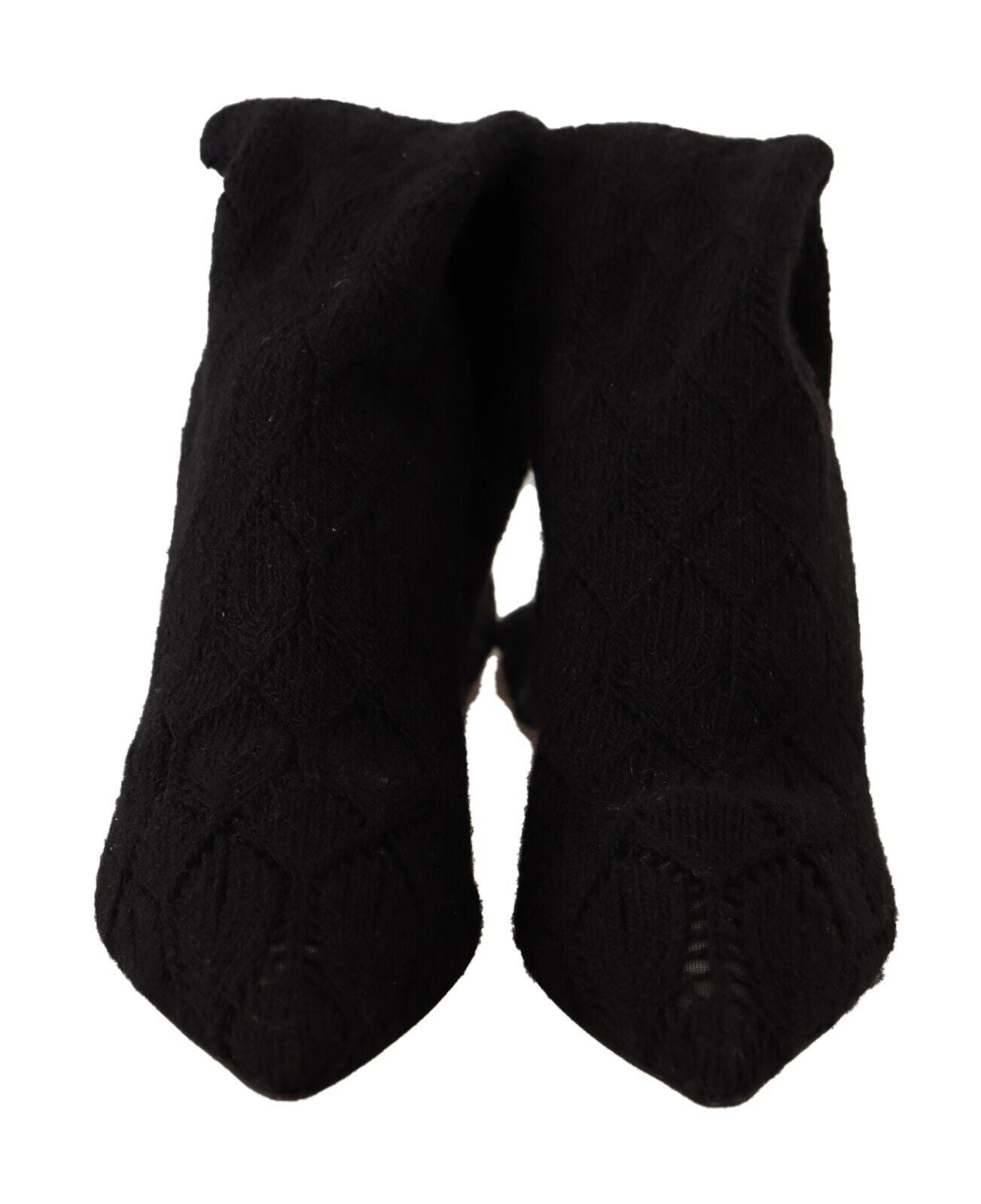 Chaussettes noires extensibles Dolce & Gabbana, portées avec bottines hautes, vues de devant sur un fond neutre.