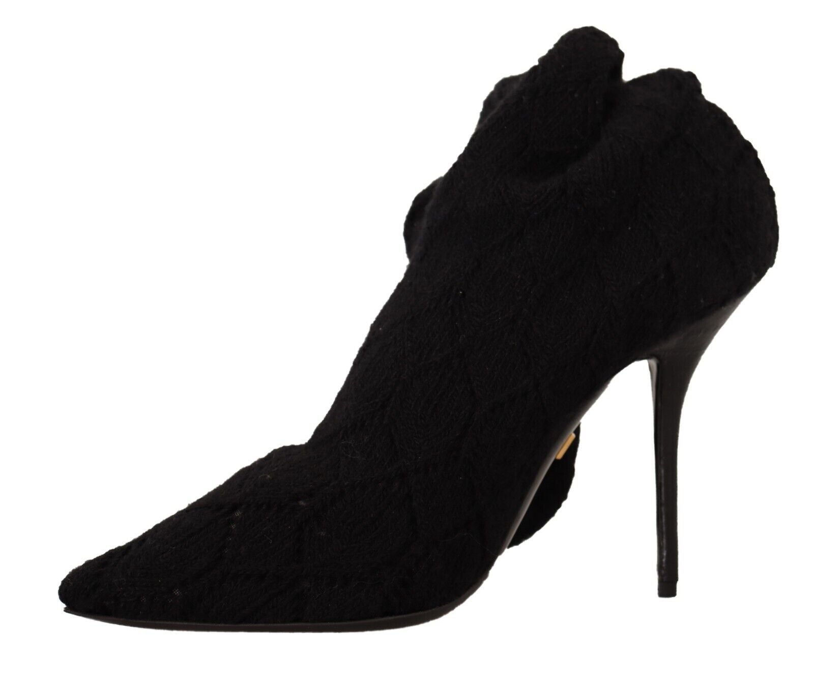 Chaussettes noires extensibles Dolce & Gabbana, mi-mollet, portées avec des bottines à talons pour femmes.