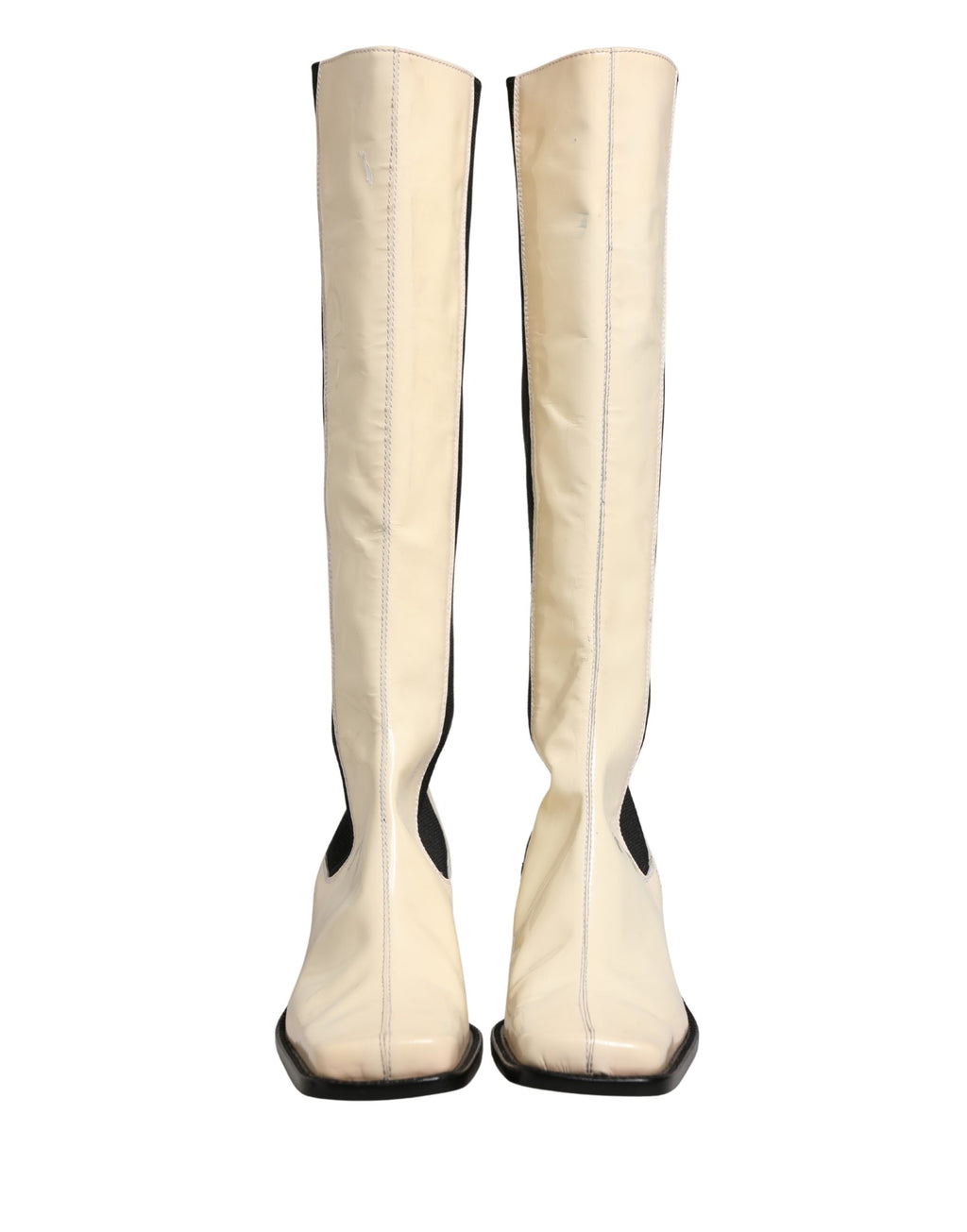 Bottes hautes en cuir blanc et noir de Dolce & Gabbana, chaussures élégantes en cuir pour femmes.