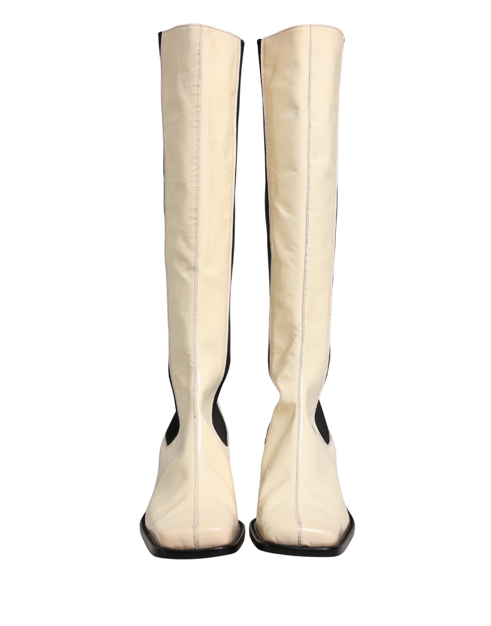 Bottes hautes en cuir blanc et noir de Dolce & Gabbana, chaussures élégantes en cuir pour femmes.