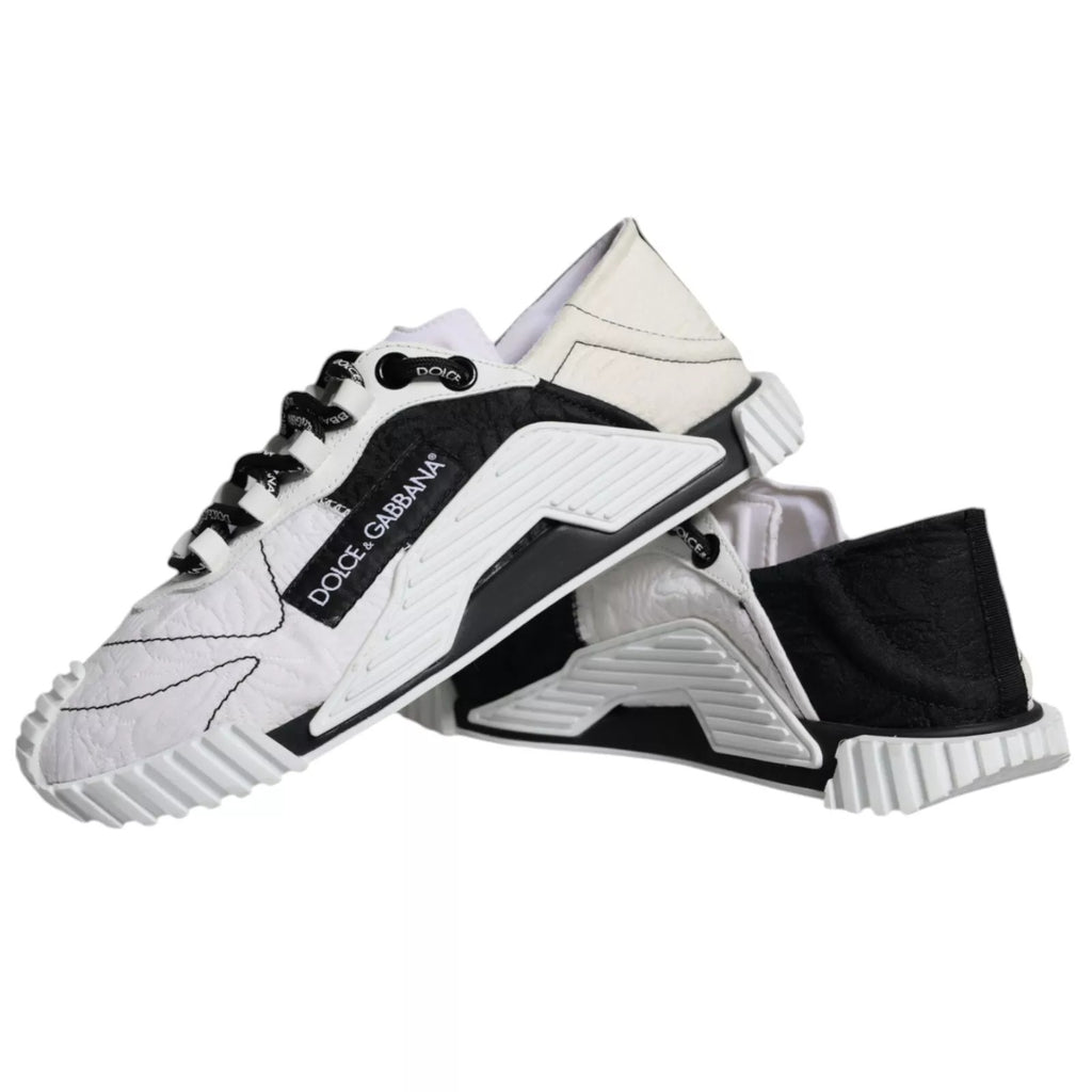 Chaussures sneakers basses Dolce & Gabbana NS1 en blanc et noir, vue de face avec détails de design modernes.