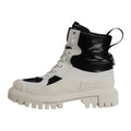Bottes en cuir blanc Dolce & Gabbana, lacées, mi-mollet, rembourrées, chaussures élégantes pour femmes.