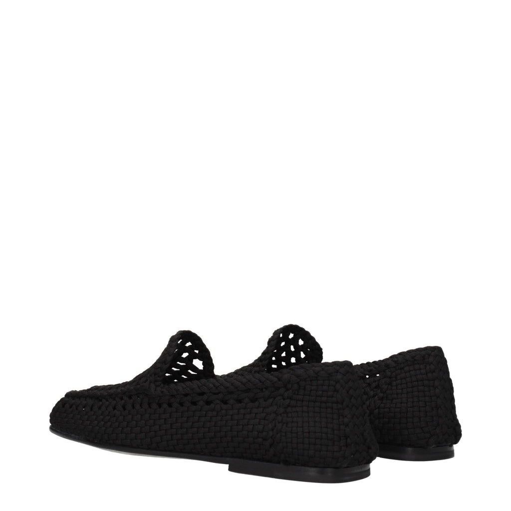 Chaussures mocassins en tissu noir Dolce & Gabbana, style slip-on, avec design élégant et finition soignée.