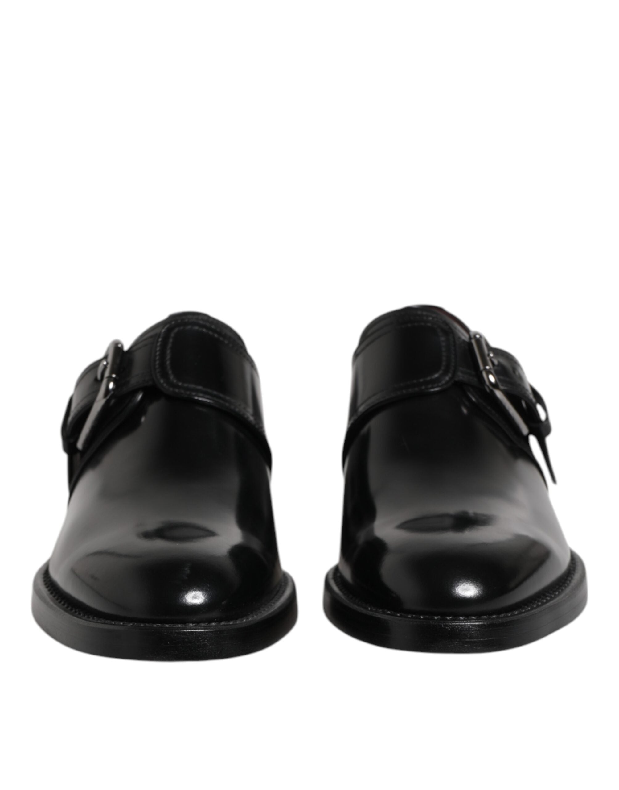 Chaussures Derby formelles en cuir noir Dolce & Gabbana avec boucle monk strap, élégantes et sophistiquées.