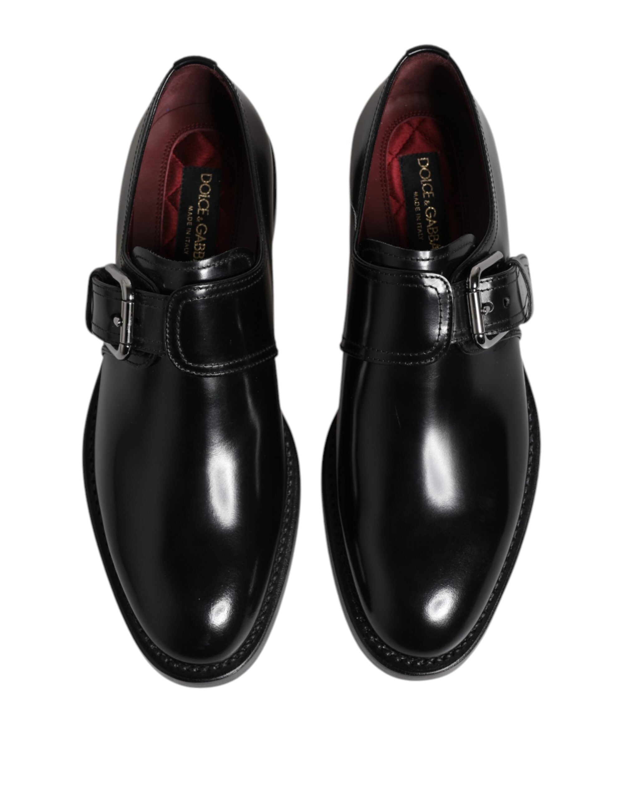 Chaussures formelles Derby en cuir noir Dolce & Gabbana avec bride monk, élégantes et sophistiquées.