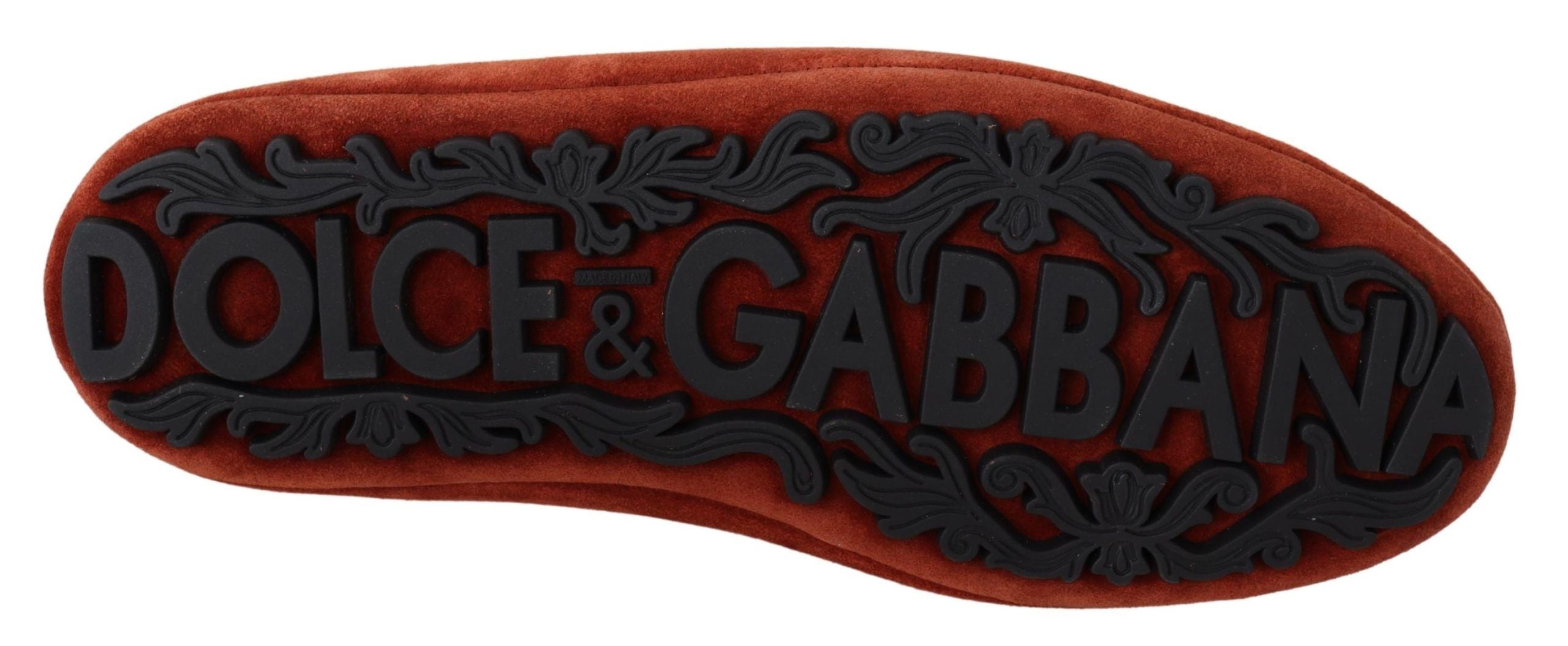 Chaussures loafers Dolce & Gabbana en cuir orange avec cristaux et couronne ornementale, élégance et style sophistiqué.