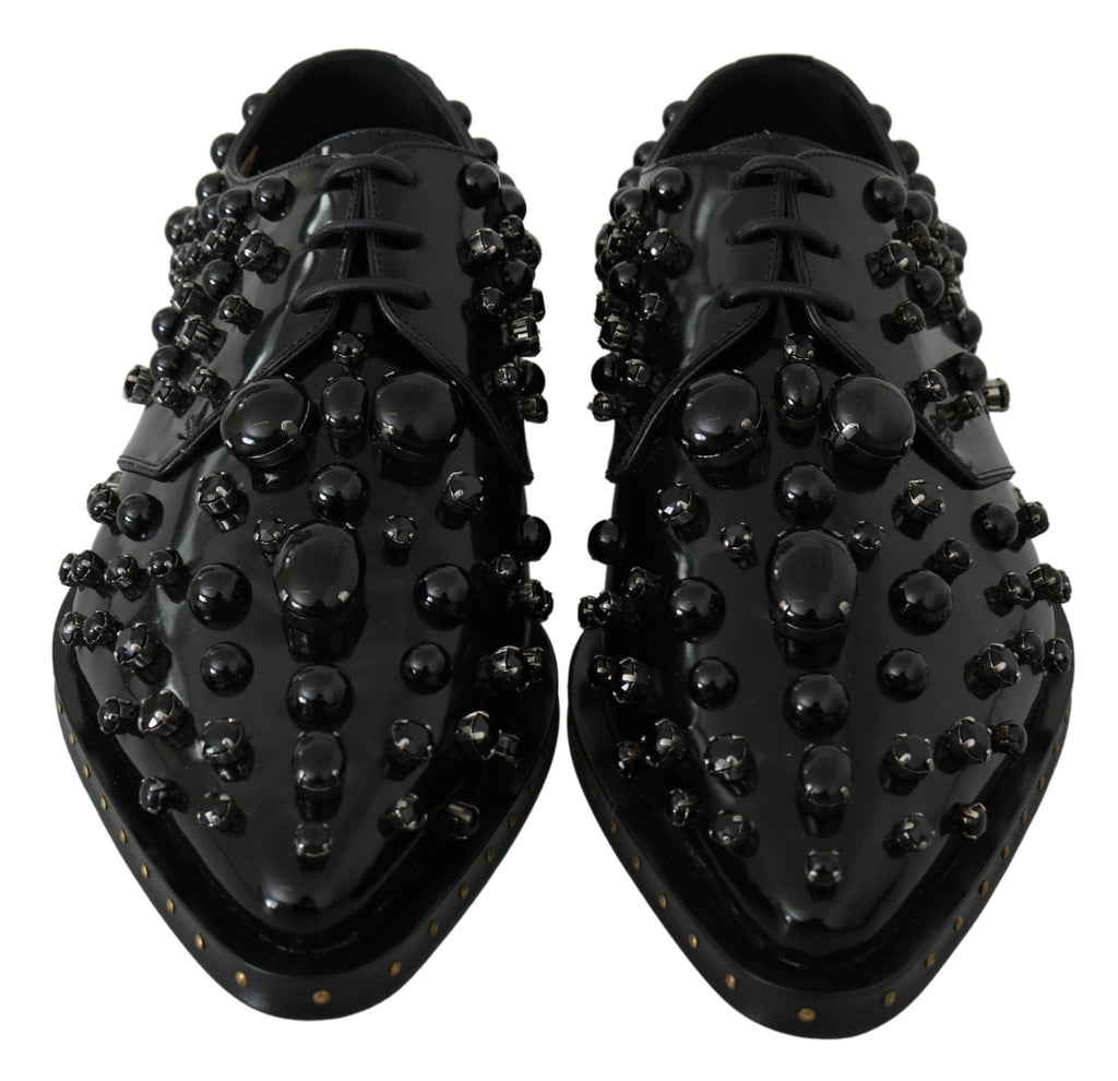 Chaussures à talons noires en cuir avec cristaux de Dolce & Gabbana, élégantes et sophistiquées pour femme.