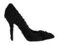 Escarpins en cuir et fourrure de agneau noir de Dolce & Gabbana, style élégant et sophistiqué.