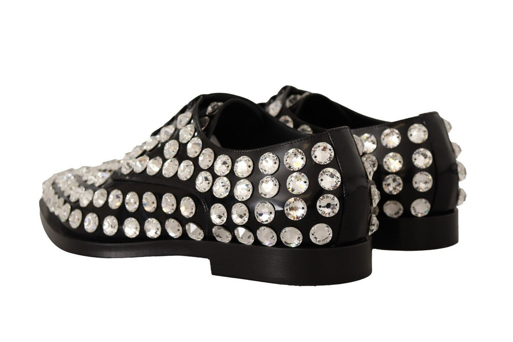 Chaussures formelles en cuir noir de Dolce & Gabbana avec cristaux et laçage, élégantes et sophistiquées.