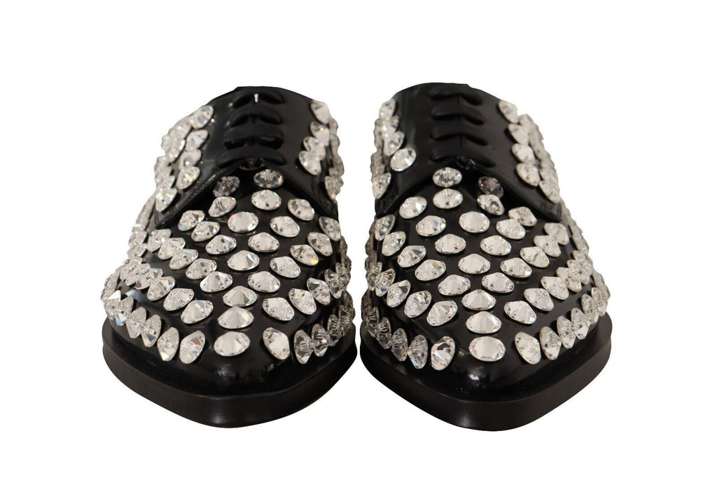 Chaussures formelles en cuir noir avec cristaux et lacets de Dolce & Gabbana, élégantes et sophistiquées.
