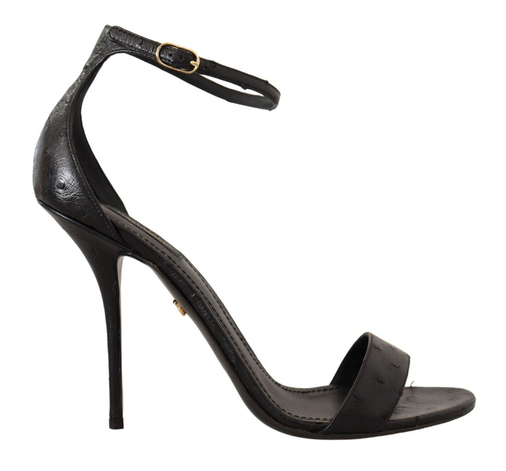 Sandales à talons Dolce & Gabbana en ostrich noir avec bride à la cheville et semelle en cuir.