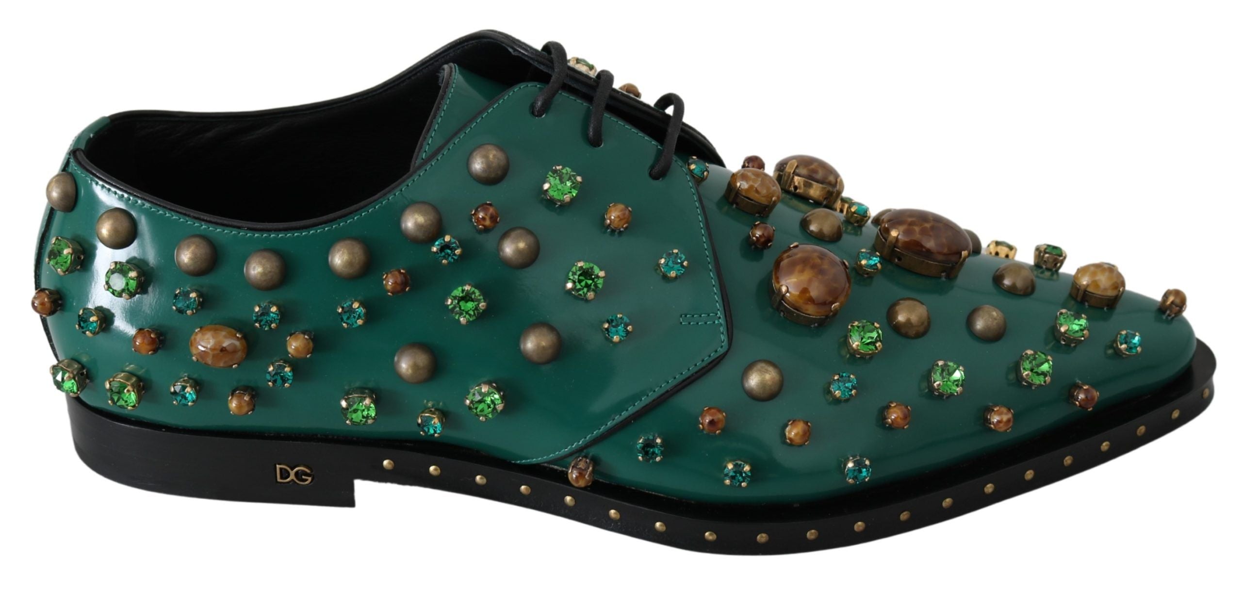 Chaussures Dolce & Gabbana en cuir vert avec cristaux, style broque, montrant le détail élégant et la texture du cuir.