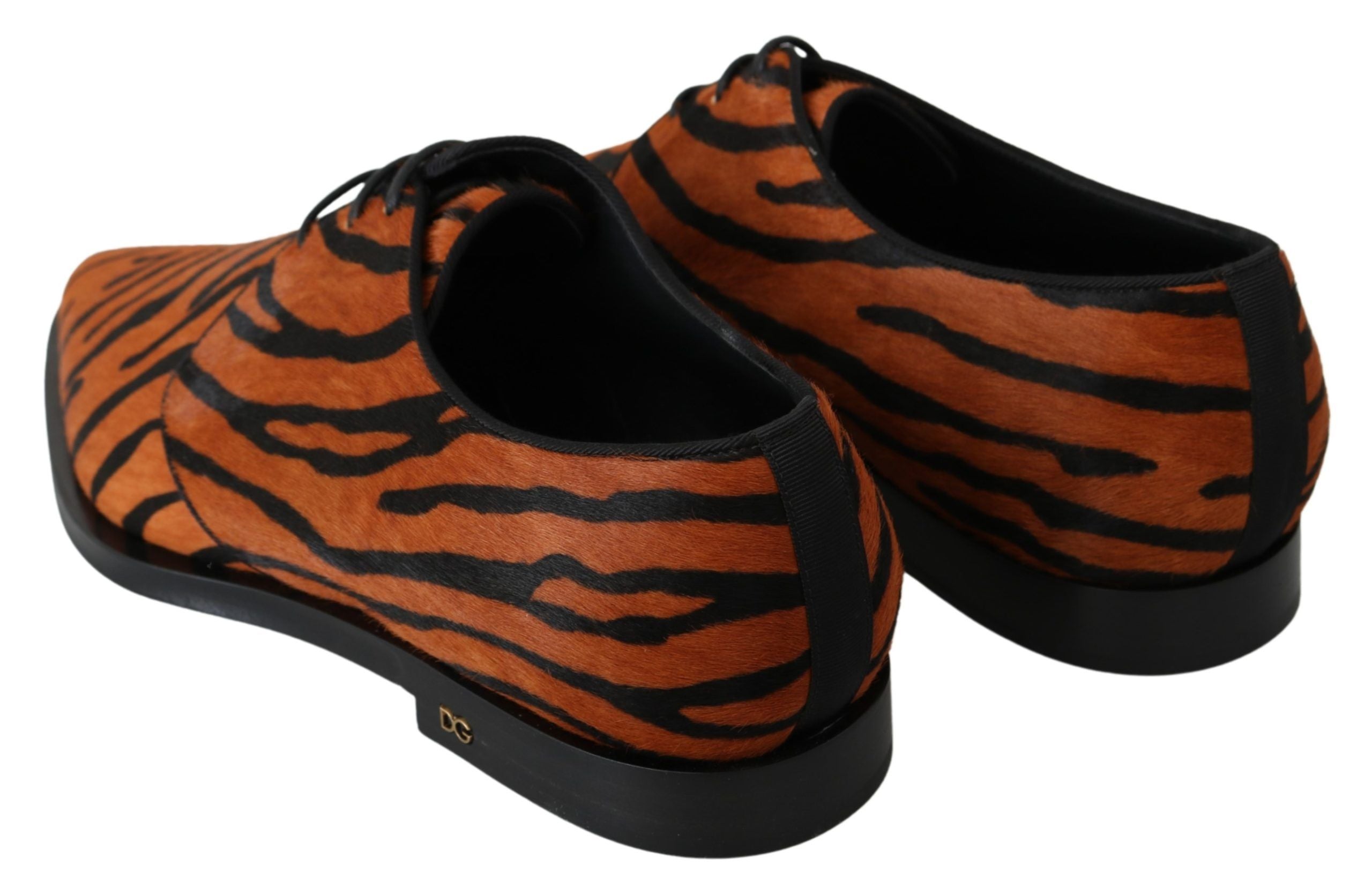 Chaussures formelles Dolce & Gabbana en cuir de poney orange avec broque, élégantes et sophistiquées.