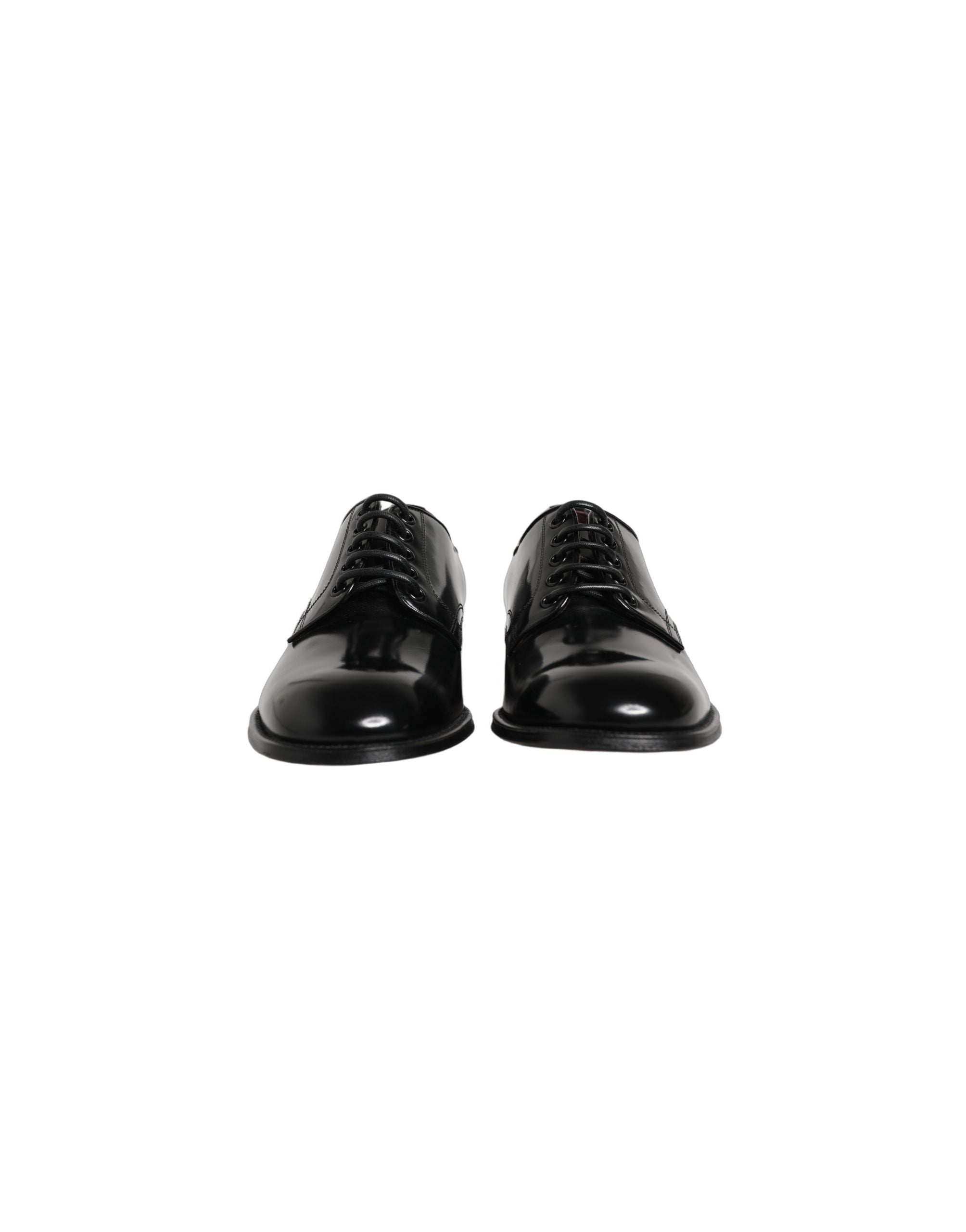 Chaussures Derby en cuir de veau noir de Dolce & Gabbana pour homme, élégantes et classiques.