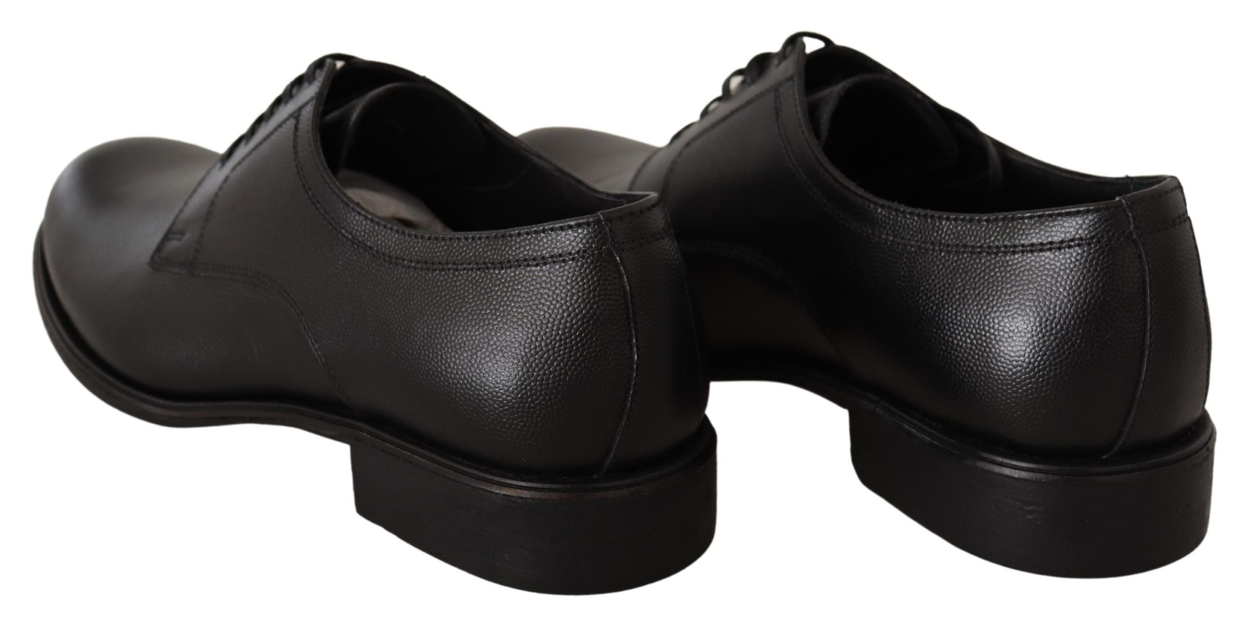 Chaussures derby noires en cuir pour homme de marque Dolce & Gabbana, lacets élégants et finition sophistiquée.