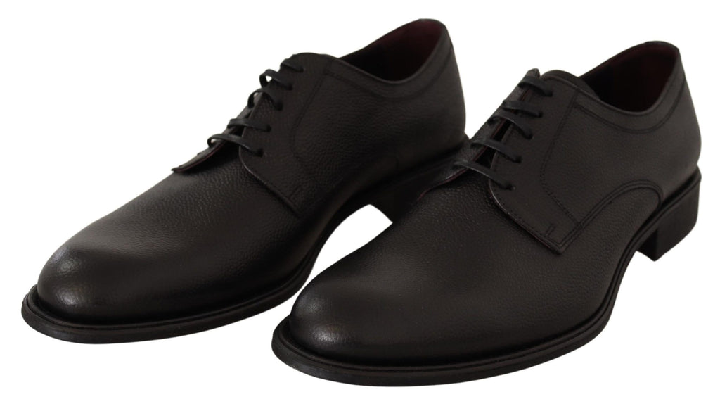 Chaussures derby noires en cuir pour homme de la marque Dolce & Gabbana, lacets et style formel élégant.