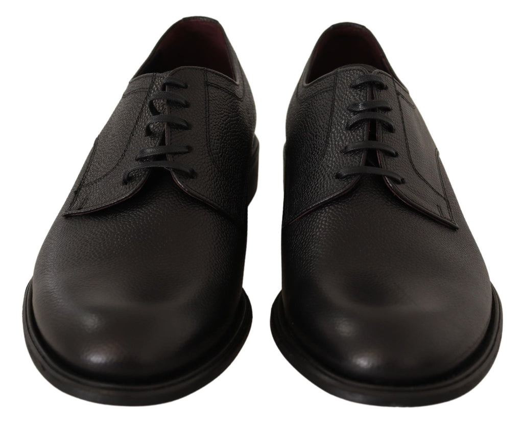 Chaussures derby formelles en cuir noir pour homme de Dolce & Gabbana, lacets, style élégant et sophistiqué.