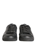 Chaussures Dolce & Gabbana en cuir noir, baskets basses à lacets, style élégant et moderne pour homme.