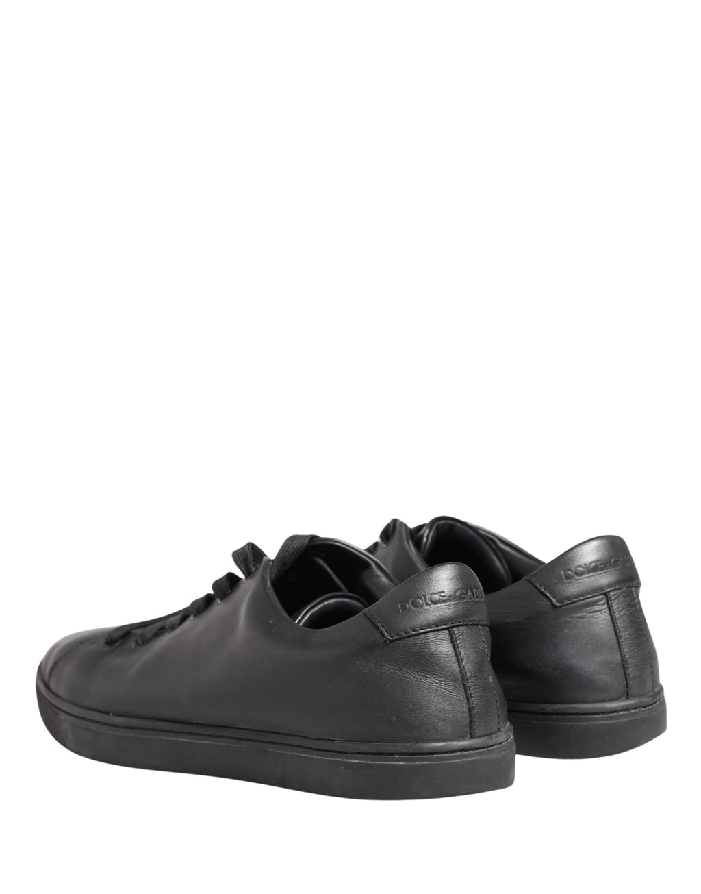 Chaussures sneakers basses en cuir noir Dolce & Gabbana avec lacets, vues de face sur fond blanc.