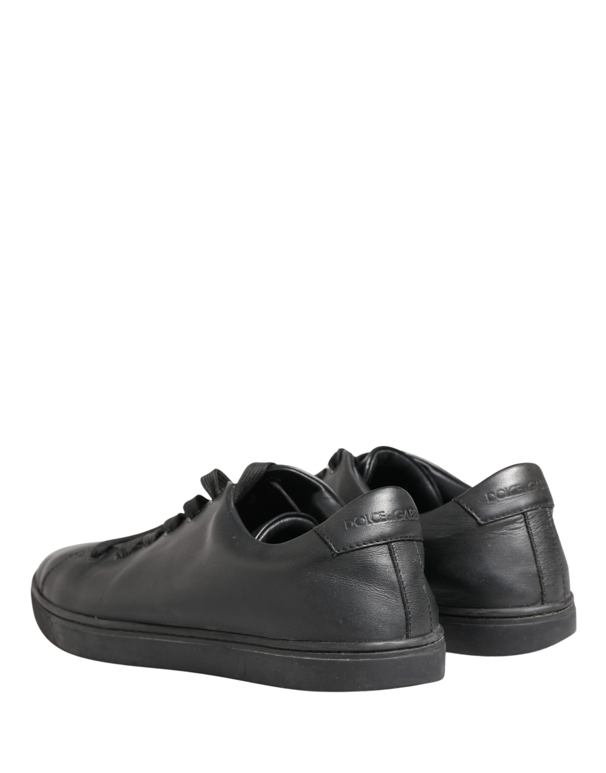 Chaussures sneakers basses en cuir noir Dolce & Gabbana avec lacets, vues de face sur fond blanc.