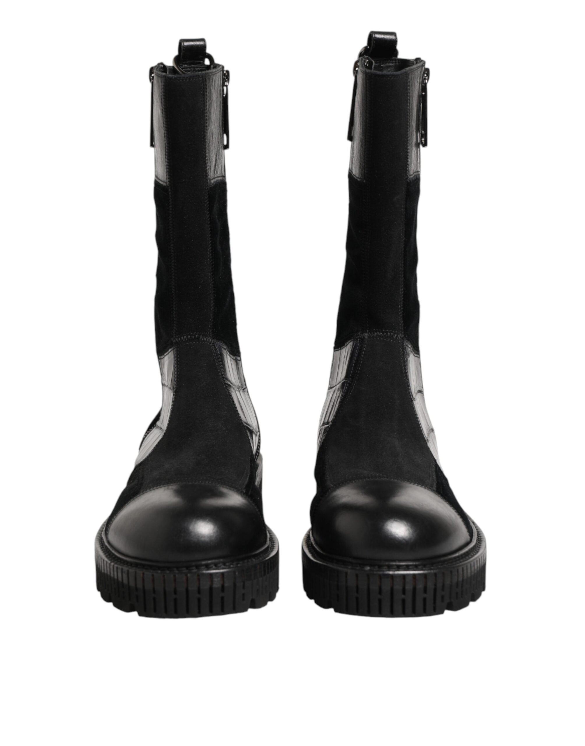Bottes en cuir patchwork noir Dolce & Gabbana, mi-mollet, avec détails de couture élégants et semelle en caoutchouc.