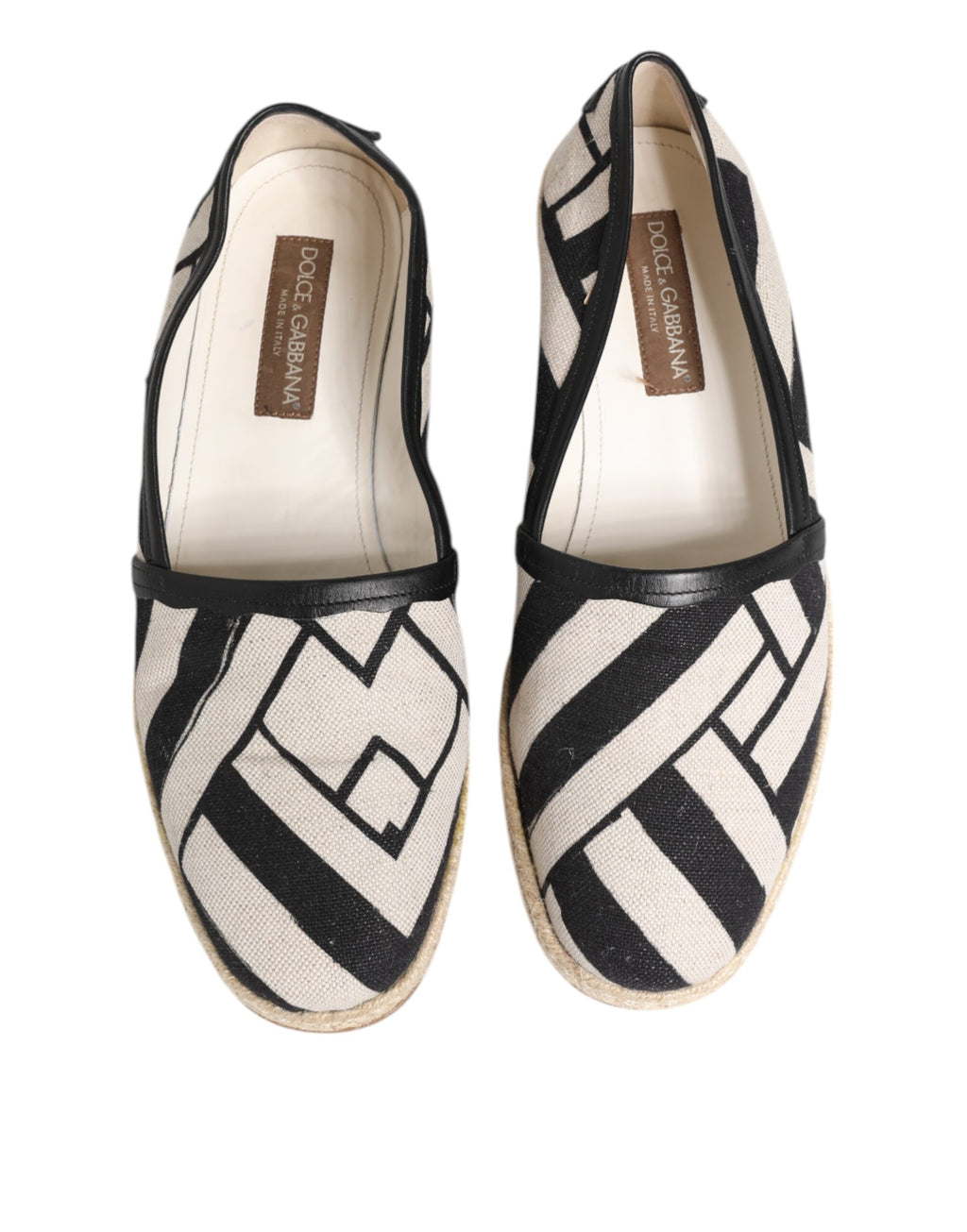 Chaussures espadrilles plates Dolce & Gabbana à rayures noires et blanches, vue de face, en toile avec semelle en corde.