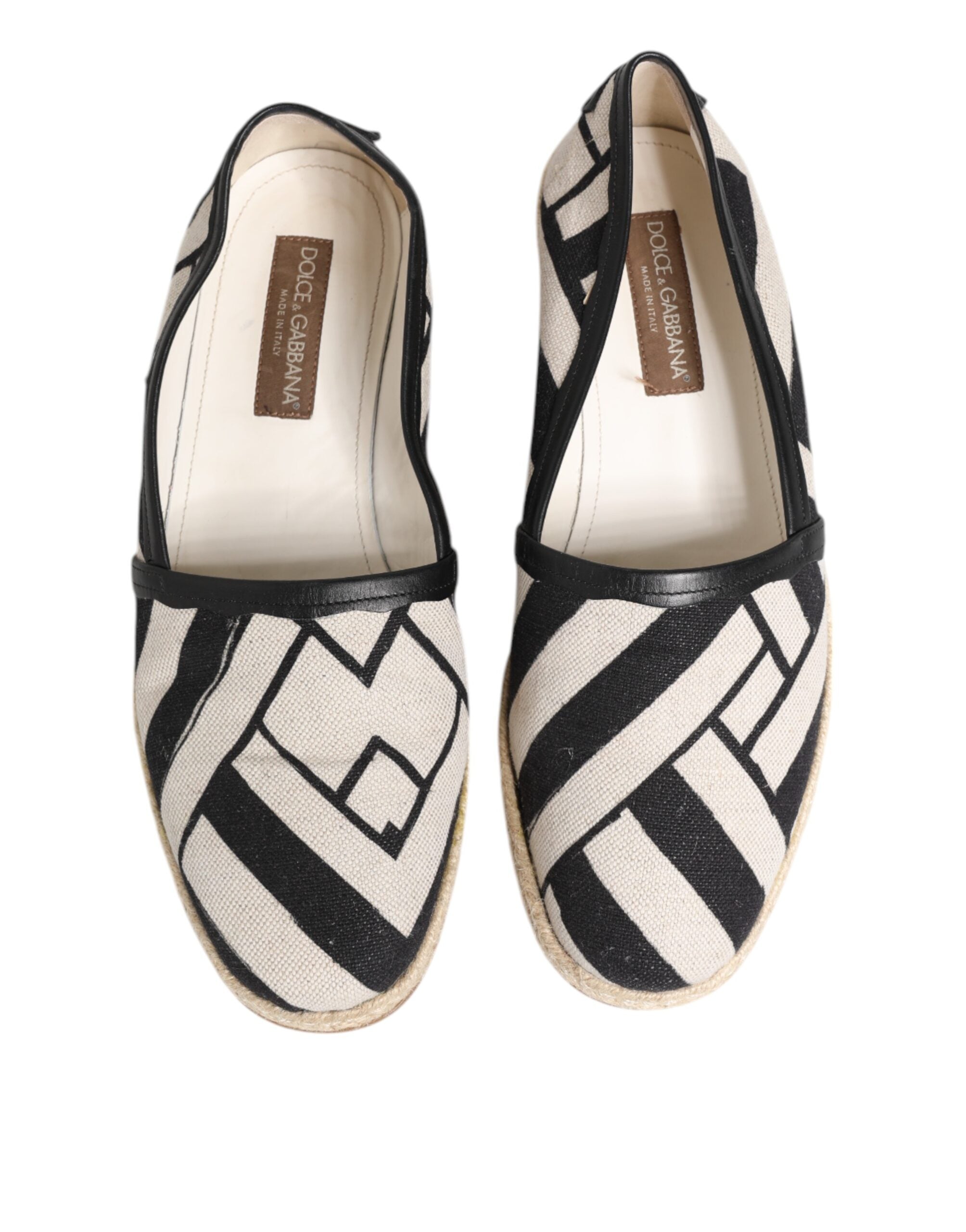 Chaussures espadrilles plates Dolce & Gabbana à rayures noires et blanches, vue de face, en toile avec semelle en corde.