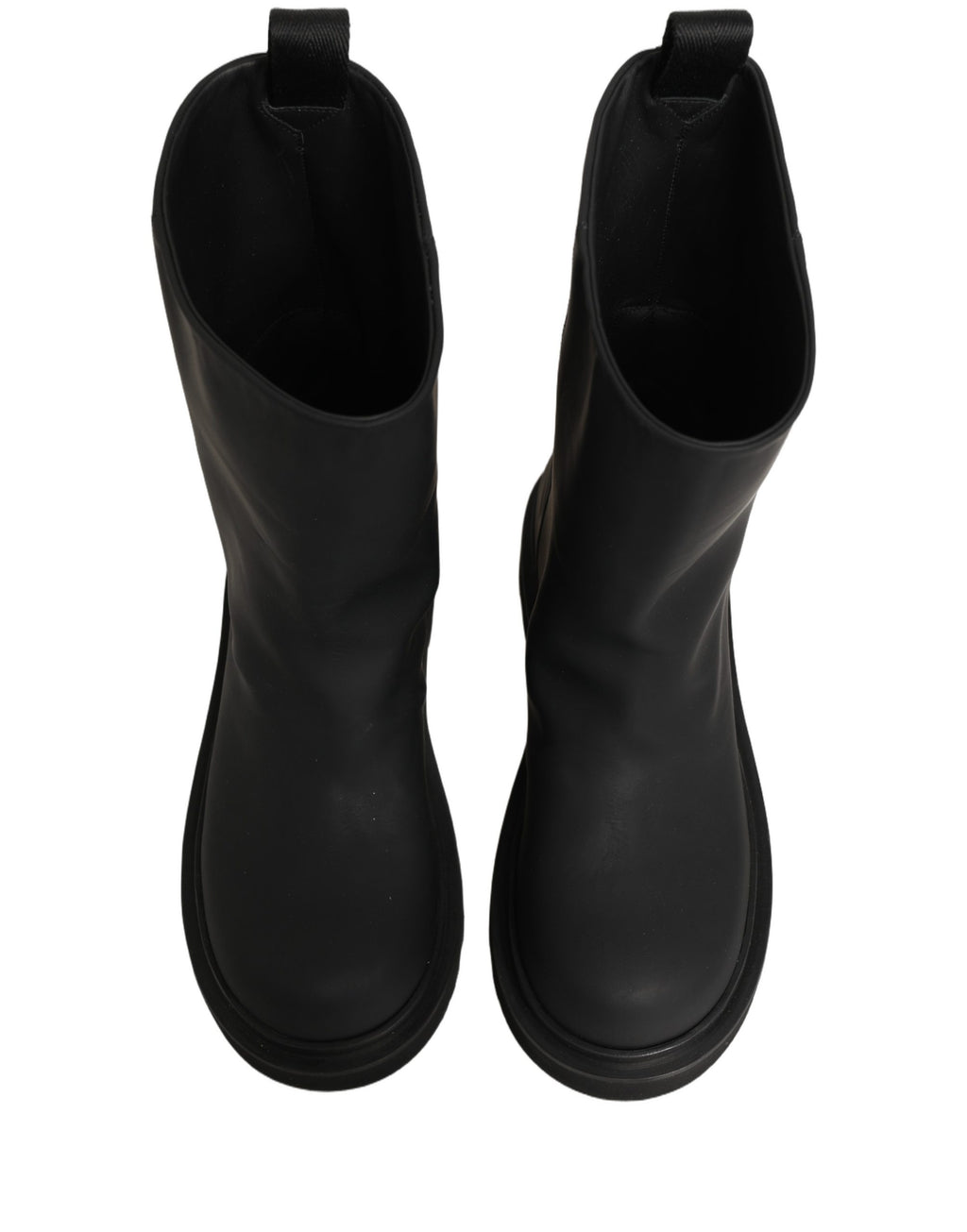 Bottes pour hommes Dolce & Gabbana en cuir noir, mi-mollet, à talon épais, avec design robuste et élégant.