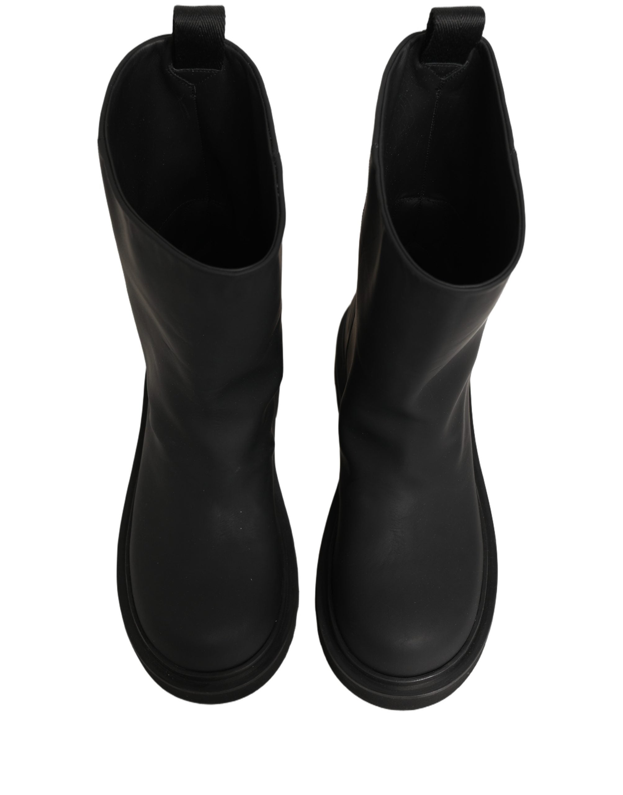 Bottes pour hommes Dolce & Gabbana en cuir noir, mi-mollet, à talon épais, avec design robuste et élégant.
