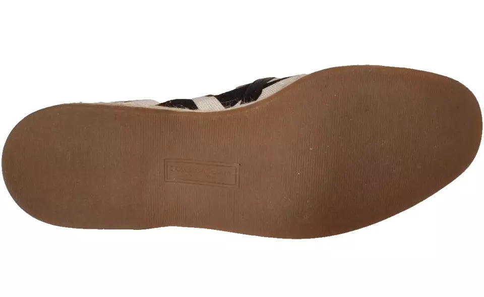 Chaussures espadrilles Dolce & Gabbana à rayures noires et blanches, modèle slip-on, vues de face sur fond neutre.