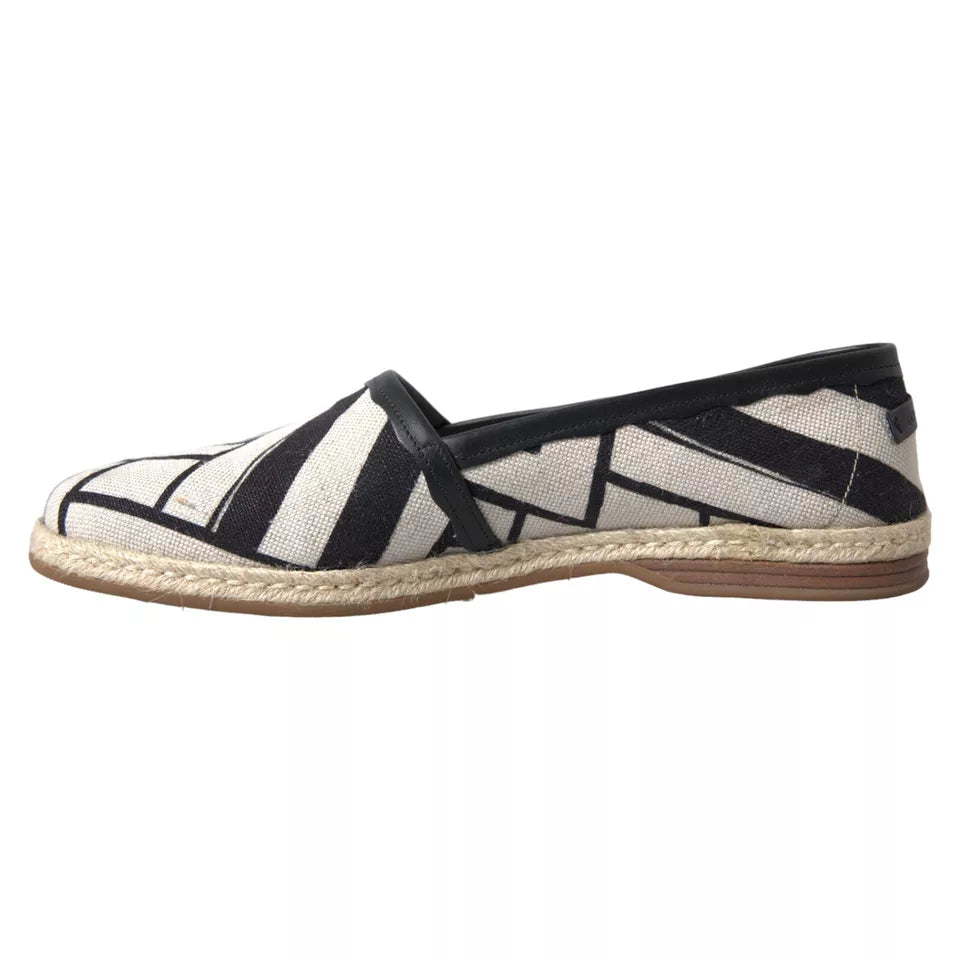 Chaussures espadrilles Dolce & Gabbana à rayures noires et blanches, slip-on élégantes en toile et jute.