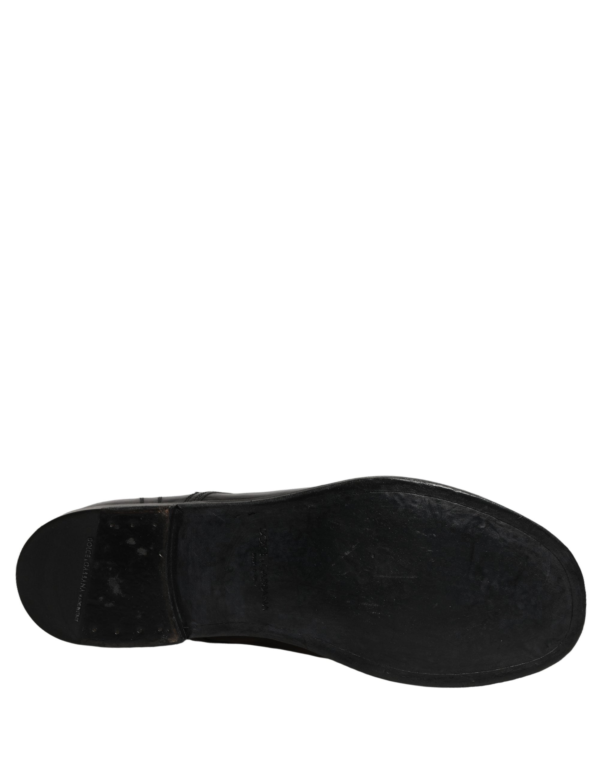 Chaussures derby noires en cuir pour homme de la marque Dolce & Gabbana, chaussures formelles élégantes et sophistiquées.