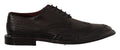 Chaussures Derby formelles en cuir noir Dolce & Gabbana avec détails wingtip et lacets, style élégant pour homme.