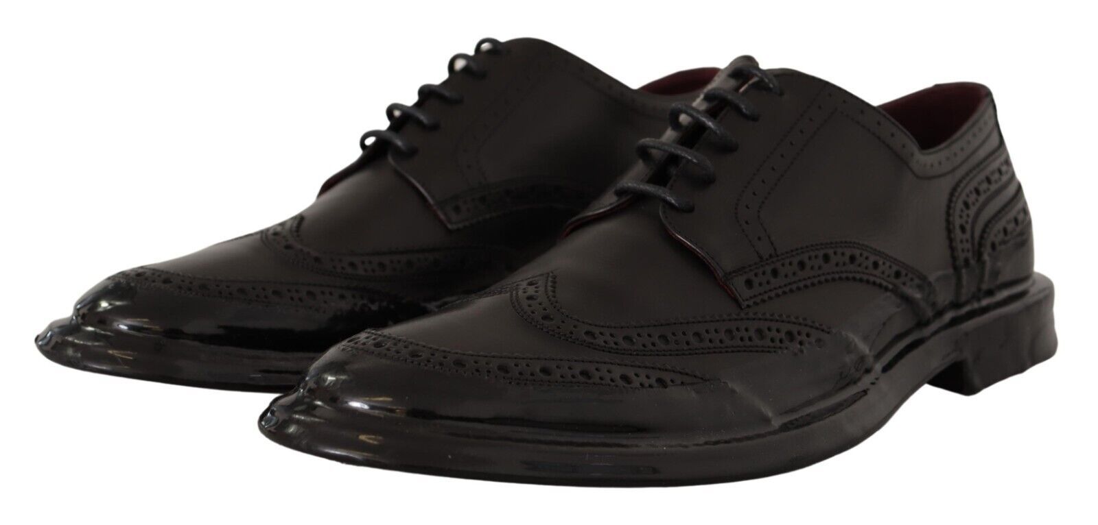 Chaussures Derby Oxford noires Dolce & Gabbana en cuir avec détails wingtip pour occasion formelle.