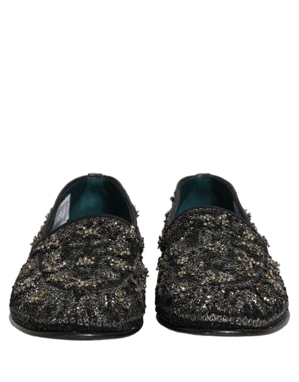 Chaussures loafers Dolce & Gabbana noires avec embellissements en strass scintillants et détails en cuir élégant.