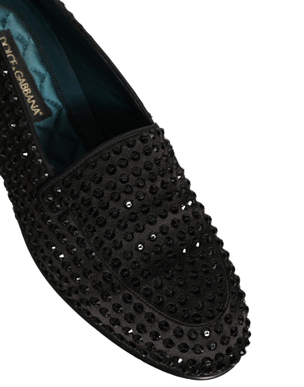 Chaussures loafers Dolce & Gabbana noires ornées de strass brillants, finition élégante et sophistiquée.