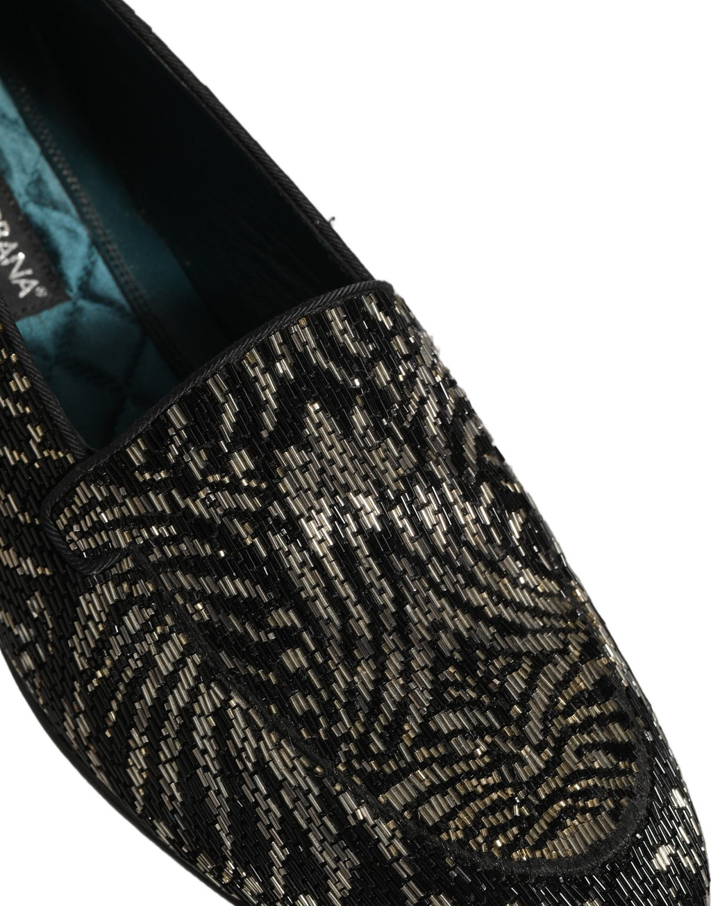 Chaussures loafers Dolce & Gabbana noires et argentées ornées de broderies et de détails en embellissements.