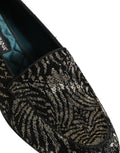 Chaussures loafers Dolce & Gabbana noires et argentées ornées de broderies et de détails en embellissements.