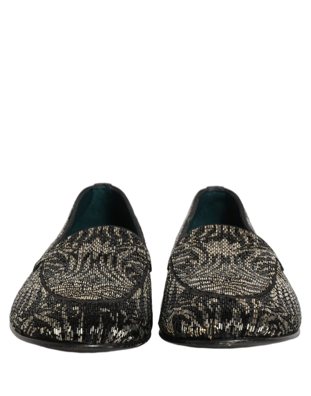 Chaussures loafers Dolce & Gabbana noires et argentées avec ornements brillants, style élégant et sophistiqué.